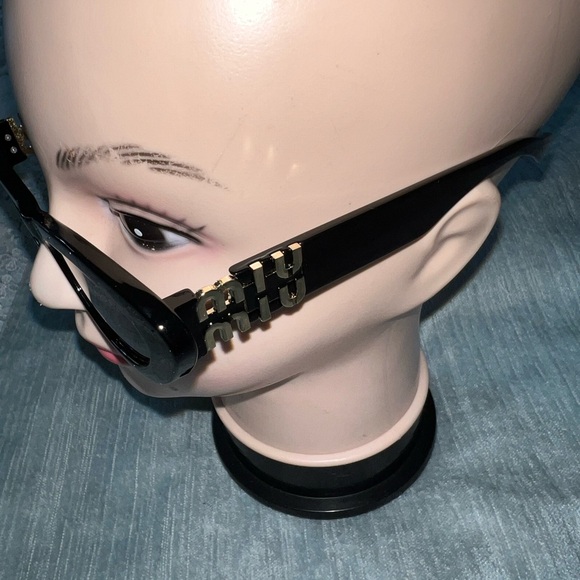 Miu Miu Black Sunglasses with Gold Detail - Picture 1 of 3